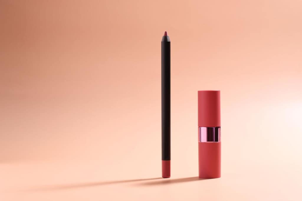 Waterproof lip liner products displayed in luxury cosmetic studio setup for private label beauty brands and OEM suppliers.